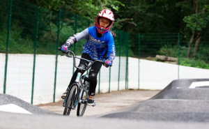 Young cyclist in a helmet